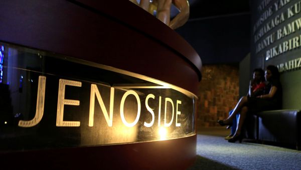 People sit inside the Kigali Genocide Memorial Museum as the country prepares to commemorate the 1994 Genocide in the Rwandan capital April 5, 2014. An estimated 800,000 people were killed in 100 days during the genocide. - Sputnik International