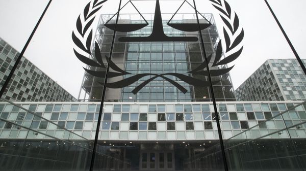FILE- In this Nov. 7, 2019 file photo, the International Criminal Court, or ICC, is seen in The Hague, Netherlands. President Donald Trump has lobbed a broadside attack against the International Criminal Court. He's authorizing economic sanctions and travel restrictions against court workers directly involved in investigating American troops and intelligence officials for possible war crimes in Afghanistan without U.S. consent. The executive order Trump signed on Thursday marks his administration’s latest attack against international organizations, treaties and agreements that do not hew to its policies. (AP Photo/Peter Dejong, File) FILE- In this Nov. 7, 2019 file photo, the International Criminal Court, or ICC, is seen in The Hague, Netherlands. President Donald Trump has lobbed a broadside attack against the International Criminal Court. He's authorizing economic sanctions and travel restrictions against court workers directly involved in investigating American troops and intelligence officials for possible war crimes in Afghanistan without U.S. consent. The executive order Trump signed on Thursday marks his administration’s latest attack against international organizations, treaties and agreements that do not hew to its policies. (AP Photo/Peter Dejong, File) - Sputnik International
