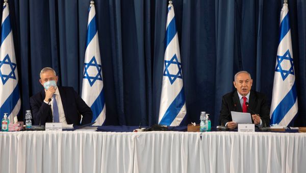 Israeli Prime Minister Benjamin Netanyahu and Israeli Defense Minister Benny Gantz attend the weekly cabinet meeting at the Ministry of Foreign Affairs in Jerusalem, June 14, 2020 Israeli Prime Minister Benjamin Netanyahu and Israeli Defense Minister Benny Gantz attend the weekly cabinet meeting at the Ministry of Foreign Affairs in Jerusalem, June 14, 2020 - Sputnik International