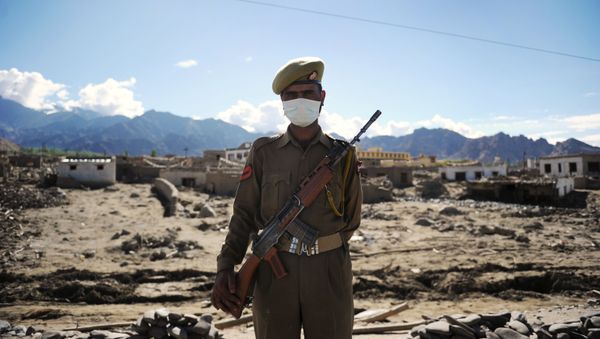 An Indian armed forces serviceman stands guard (File) An Indian armed forces serviceman stands guard (File) - Sputnik International