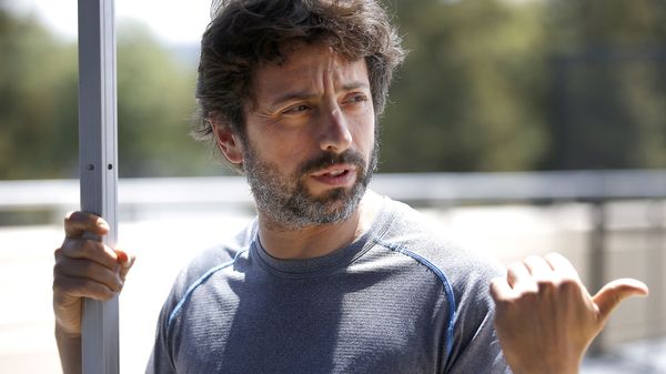 In this May 13, 2015 photo, Google co-founder Sergey Brin, speaks to reporters and guests about the new Google self-driving prototype car during a demonstration at the Google campus in Mountain View, Calif.  The car, which needs no gas pedal or steering wheel, will make its debut on public roads this summer - Sputnik International