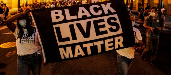 People hold up a Black Lives Matter banner as they march during a demonstration against racial inequality in the aftermath of the death in Minneapolis police custody of George Floyd, in Washington, U.S., June 14, 2020 People hold up a Black Lives Matter banner as they march during a demonstration against racial inequality in the aftermath of the death in Minneapolis police custody of George Floyd, in Washington, U.S., June 14, 2020 - Sputnik International