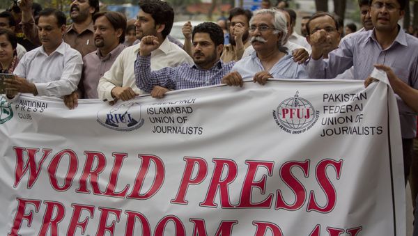 Pakistan journalists rally to observe the World Press Freedom Day in Islamabad, Pakistan, Tuesday, May 3, 2016. Dozens of journalists gathered shouting slogans for the freedom of press. - Sputnik International