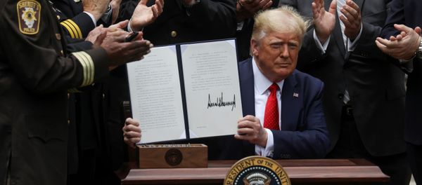 U.S. President Donald Trump displays an executive order on police reform during a signing ceremony in the Rose Garden at the White House in Washington, U.S., June 16, 2020. U.S. President Donald Trump displays an executive order on police reform during a signing ceremony in the Rose Garden at the White House in Washington, U.S., June 16, 2020. - Sputnik International