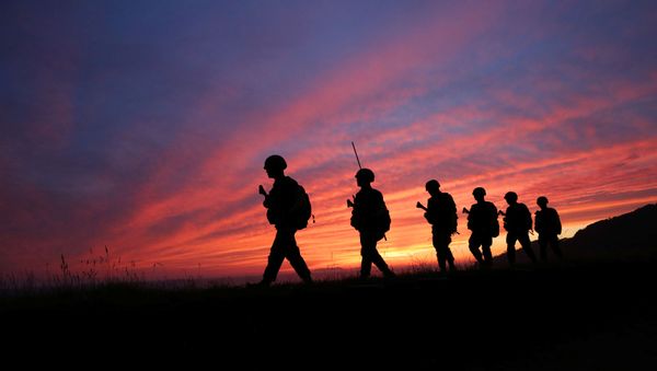 Members of South Korean marine corps patrol during sunset in Yeonpyeong island near the northern limited line, South Korea, June 16, 2020.  - Sputnik International