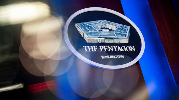 The Pentagon logo is seen behind the podium in the briefing room at the Pentagon in Arlington, Virginia, U.S., January 8, 2020.  - Sputnik International