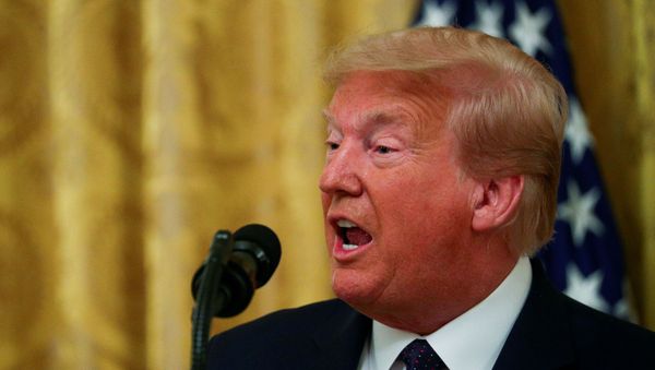 U.S. President Donald Trump speaks during an event held to discuss an administration plan aimed at helping to prevent suicides by U.S. veterans and other Americans, in the East Room at the White House in Washington, U.S., June 17, 2020.  - Sputnik International