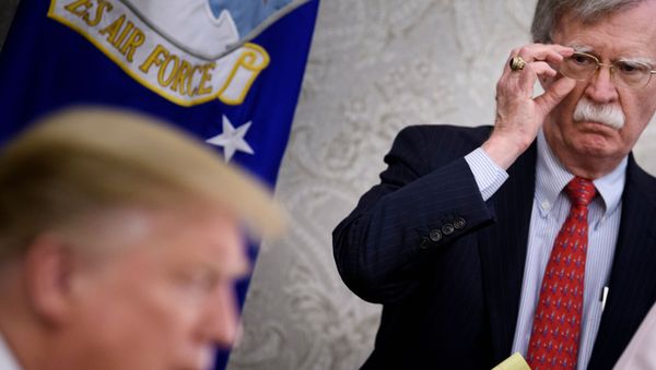 In this file photo taken on May 13, 2019, National Security Advisor John Bolton listens while US President Donald Trump speaks to the press before a meeting with Hungary's Prime Minister Viktor Orban in the Oval Office of the White House in Washington, DC. - Trump has no guiding principles and is unfit to be president, Bolton said in an interview released on June 18, 2020, to promote his explosive book. I don't think he's fit for office. I don't think he has the competence to carry out the job, Bolton told ABC News. In this file photo taken on May 13, 2019, National Security Advisor John Bolton listens while US President Donald Trump speaks to the press before a meeting with Hungary's Prime Minister Viktor Orban in the Oval Office of the White House in Washington, DC. - Trump has no guiding principles and is unfit to be president, Bolton said in an interview released on June 18, 2020, to promote his explosive book. I don't think he's fit for office. I don't think he has the competence to carry out the job, Bolton told ABC News. - Sputnik International