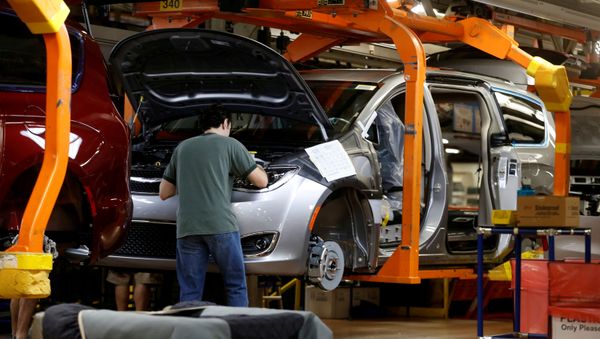 The 2019 Chrysler Pacifica minivans move down the assembly line the FCA Windsor Assembly plant in Windsor, Ontario, Canada October 5, 2018.  - Sputnik International