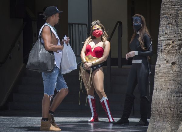 Street performers dressed as movie characters wait for customers to take photos, on Hollywood Blvd, Hollywood, California on 12 June 2020. - Sputnik International