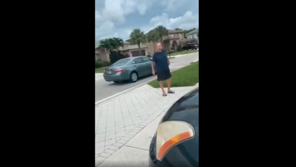 A man confronts group of teens in a Wellington gated community over apparent parked car dispute tells them You don't belong in this development. - Sputnik International