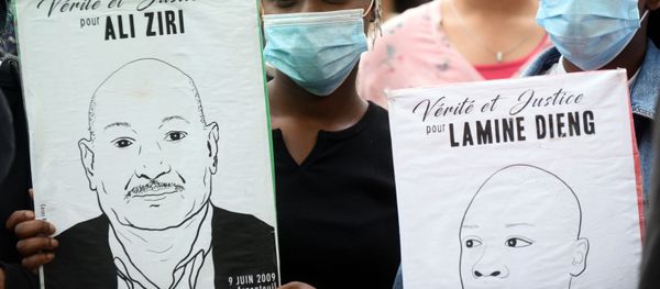 Demonstrators wearing face masks hold placards reading Justice and truth for Ali Ziri and Lamine Dieng in Toulouse, southern France, on June 10, 2020, during a protest against police violence and in memory of late US citizen George Floyd as well as late French citizen Adama Traore. - At least 2,000 people gathered on the evening of June 10 near Place du Capitole in downtown Toulouse. Demonstrators wearing face masks hold placards reading Justice and truth for Ali Ziri and Lamine Dieng in Toulouse, southern France, on June 10, 2020, during a protest against police violence and in memory of late US citizen George Floyd as well as late French citizen Adama Traore. - At least 2,000 people gathered on the evening of June 10 near Place du Capitole in downtown Toulouse. - Sputnik International