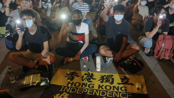 Supporters of Hong Kong anti-government movement gather at Liberty Square, to mark the one-year anniversary of the start of the protests in Hong Kong, in Taipei, Taiwan, June 13, 2020. Supporters of Hong Kong anti-government movement gather at Liberty Square, to mark the one-year anniversary of the start of the protests in Hong Kong, in Taipei, Taiwan, June 13, 2020. - Sputnik International