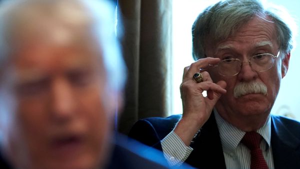 FILE PHOTO: National Security Adviser John Bolton listens as U.S. President Donald Trump holds a Cabinet meeting at the White House in Washington, U.S., April 9, 2018 - Sputnik International