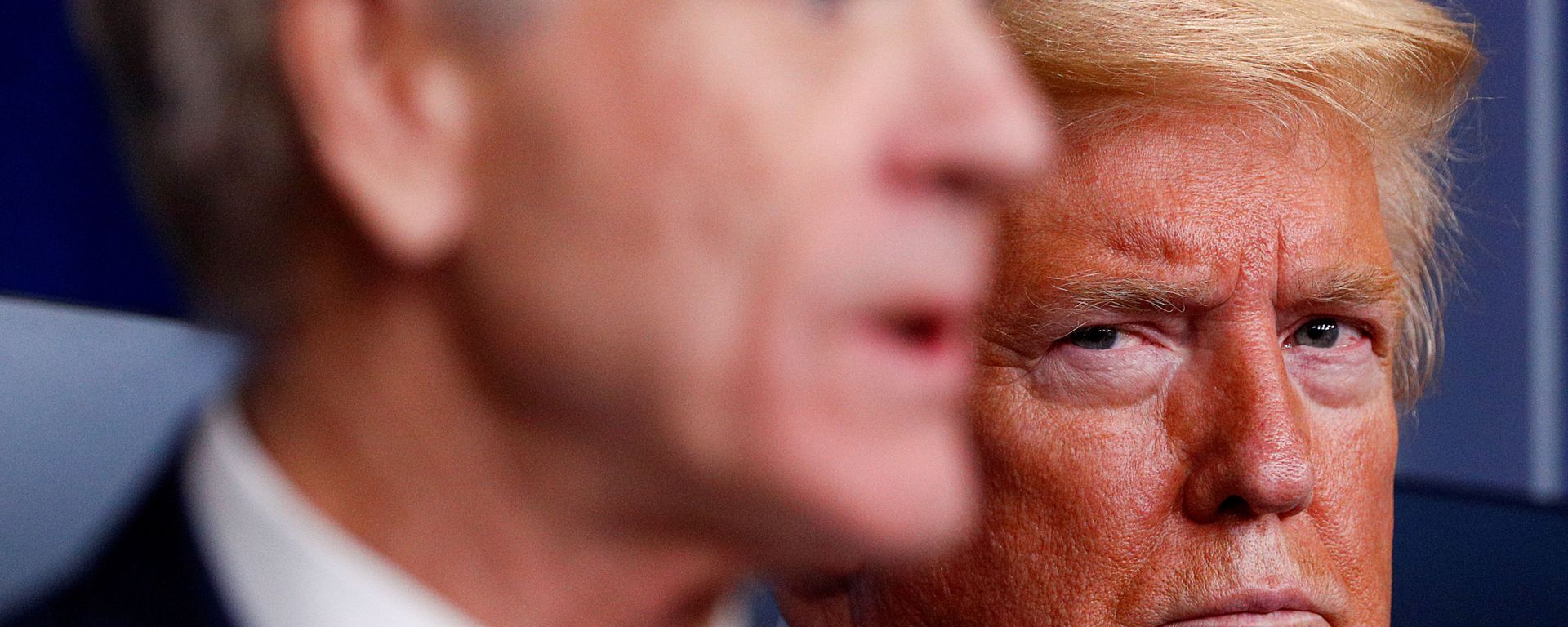 U.S. President Donald Trump listens as White House Director of Trade and Marketing Policy Peter Navarro addresses the daily coronavirus response briefing at the White House in Washington, U.S., April 2, 2020. U.S. President Donald Trump listens as White House Director of Trade and Marketing Policy Peter Navarro addresses the daily coronavirus response briefing at the White House in Washington, U.S., April 2, 2020. - Sputnik International, 1920, 05.01.2022