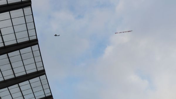 Soccer Football - Premier League - Manchester City v Burnley - Etihad Stadium, Manchester, Britain - June 22, 2020 A White Lives Matter Burnley sign is seen on a plane above the stadium , as play resumes behind closed doors following the outbreak of the coronavirus disease (COVID-19) - Sputnik International
