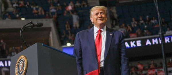 U.S. President Donald Trump smiles at the crowd as he arrives at the podium to speak during his first re-election campaign rally in several months in the midst of the coronavirus disease (COVID-19) outbreak, at the BOK Center in Tulsa, Oklahoma, U.S., June 20, 2020 U.S. President Donald Trump smiles at the crowd as he arrives at the podium to speak during his first re-election campaign rally in several months in the midst of the coronavirus disease (COVID-19) outbreak, at the BOK Center in Tulsa, Oklahoma, U.S., June 20, 2020 - Sputnik International