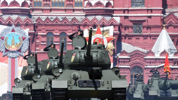 T-34 tanks (foreground) and SU-100 self-propelled tank destroyers at the military parade commemorating the 75th anniversary of Victory in the Great Patriotic War,  June 24, 2020. - Sputnik International