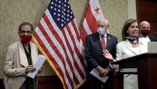 House Speaker Nancy Pelosi (D-CA) recognizes Rep. Eleanor Holmes Norton (D-DC) (L) during a joint news conference in advance of Friday's historic House vote on District of Columbia statehood bill on Capitol Hill in Washington, U.S., June 25, 2020. House Speaker Nancy Pelosi (D-CA) recognizes Rep. Eleanor Holmes Norton (D-DC) (L) during a joint news conference in advance of Friday's historic House vote on District of Columbia statehood bill on Capitol Hill in Washington, U.S., June 25, 2020. - Sputnik International