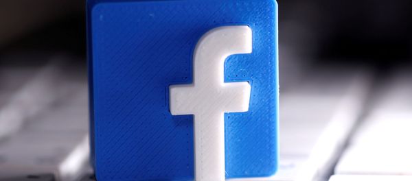 A 3D-printed Facebook logo is seen placed on a keyboard in this illustration taken March 25, 2020. A 3D-printed Facebook logo is seen placed on a keyboard in this illustration taken March 25, 2020. - Sputnik International