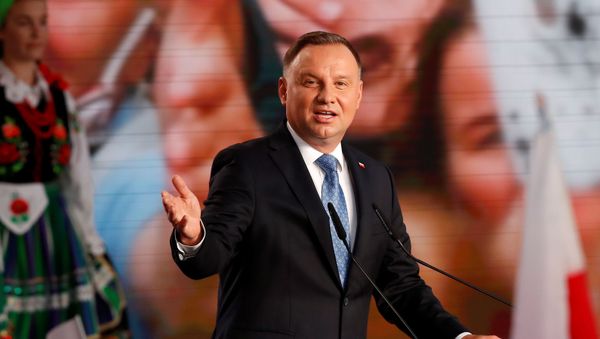 Polish President and presidential candidate of the Law and Justice (PiS) party Andrzej Duda speaks after the announcement of the first exit poll results on the first round of presidential elections in Warsaw, Poland, June 28, 2020. - Sputnik International
