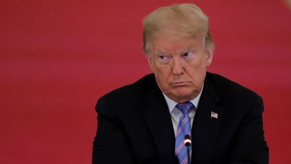 U.S. President Donald Trump listens during a meeting of the American Workforce Policy Advisory Board in the East Room at the White House in Washington, U.S., June 26, 2020. - Sputnik International