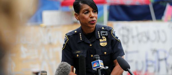 Seattle Police Chief Carmen Best holds a news conference inside the CHOP (Capitol Hill Organized Protest) area in front of the Seattle Police Department - East Precinct, hours after a fatal shooting as people occupy space in the aftermath of the death in Minneapolis police custody of George Floyd, in Seattle, Washington, U.S. June 29, 2020. Seattle Police Chief Carmen Best holds a news conference inside the CHOP (Capitol Hill Organized Protest) area in front of the Seattle Police Department - East Precinct, hours after a fatal shooting as people occupy space in the aftermath of the death in Minneapolis police custody of George Floyd, in Seattle, Washington, U.S. June 29, 2020. - Sputnik International