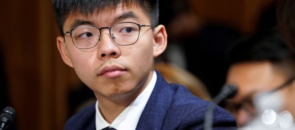  Joshua Wong, secretary-general of Hong Kong's pro-democracy Demosisto party and leader of the Umbrella Movement, listens to testimony at a Congressional-Executive Commission on China (CECC) hearing on Capitol Hill in Washington, U.S., September 17, 2019 - Sputnik International
