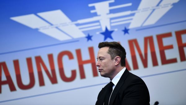 Elon Musk looks on as US President Donald Trump attends SpaceX launch at the Kennedy Space Center in Florida on May 27, 2020. - Sputnik International