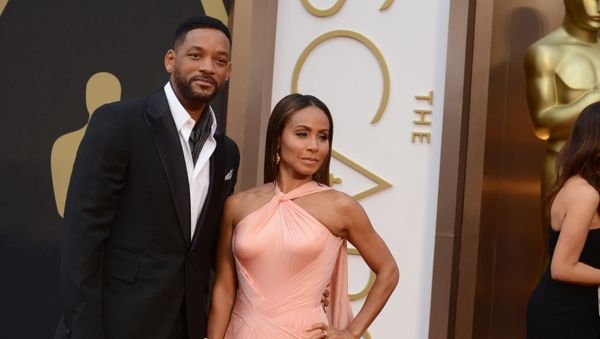 Will Smith, left, and Jada Pinkett Smith arrive at the Oscars on Sunday, March 2, 2014, at the Dolby Theatre in Los Angeles - Sputnik International