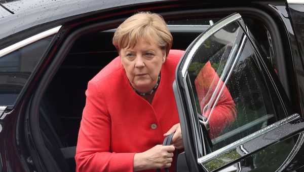 German Chancellor Angela Merkel arrives to attend a session of the lower house of parliament Bundestag, in Berlin, Germany July 1, 2020. German Chancellor Angela Merkel arrives to attend a session of the lower house of parliament Bundestag, in Berlin, Germany July 1, 2020. - Sputnik International