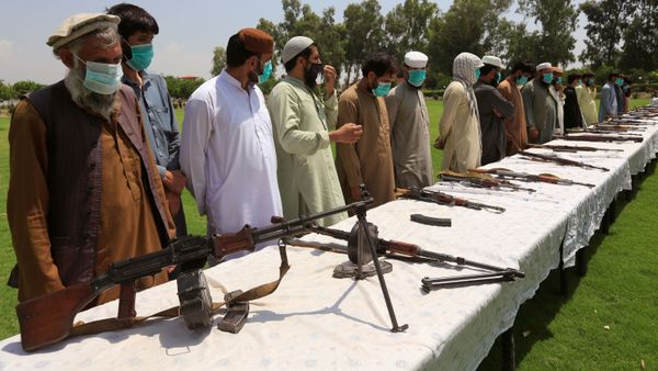 Members of the Taliban handover their weapons and join in the Afghan government's reconciliation and reintegration program in Jalalabad, Afghanistan June 25, 2020. Members of the Taliban handover their weapons and join in the Afghan government's reconciliation and reintegration program in Jalalabad, Afghanistan June 25, 2020. - Sputnik International