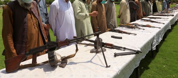 Members of the Taliban handover their weapons and join in the Afghan government's reconciliation and reintegration program in Jalalabad, Afghanistan June 25, 2020. Members of the Taliban handover their weapons and join in the Afghan government's reconciliation and reintegration program in Jalalabad, Afghanistan June 25, 2020. - Sputnik International