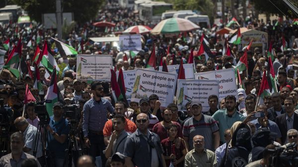 Palestinians demonstrate against Israeli plans for the annexation of parts of the West Bank, in Gaza City, Wednesday, July 1, 2020. Palestinians demonstrate against Israeli plans for the annexation of parts of the West Bank, in Gaza City, Wednesday, July 1, 2020. - Sputnik International