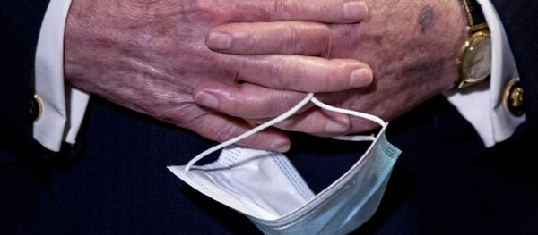 In this June 16, 2020, file photo Senate Majority Leader Mitch McConnell, R-Ky., holds a face mask in his hands during a news conference following a Senate policy luncheon on Capitol Hill in Washington. In this June 16, 2020, file photo Senate Majority Leader Mitch McConnell, R-Ky., holds a face mask in his hands during a news conference following a Senate policy luncheon on Capitol Hill in Washington. - Sputnik International