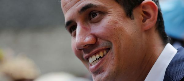 Venezuelan opposition leader Juan Guaido takes part in a news conference after Venezuela's pro-government supreme court replaced the leaders of two key opposition parties, months ahead of legislative elections in Caracas, Venezuela June 17, 2020 - Sputnik International