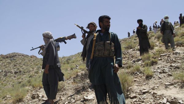In this Friday, May 27, 2016 photo, Taliban fighters stand guard as senior leader of a breakaway faction of the Taliban Mullah Abdul Manan Niazi, not pictured, delivers a speech to his fighters, in Shindand district of Herat province, Afghanistan - Sputnik International