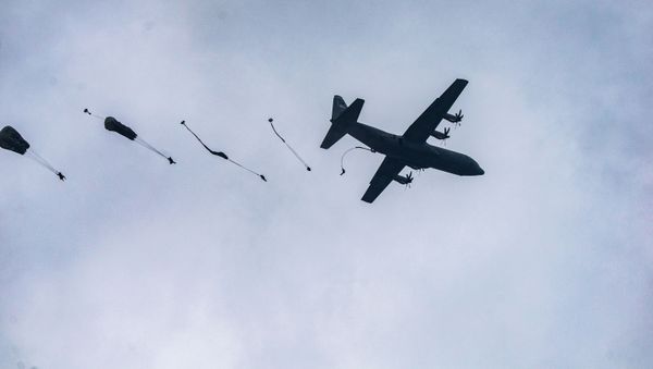 U.S. Army Paratroopers from the 1st Squadron (Airborne), 91st Cavalry Regiment, 173rd Airborne Brigade, jump from a C-130 Hercules during an airborne jump at Grafenwoehr Training Area, Germany, June 10, 2020 - Sputnik International