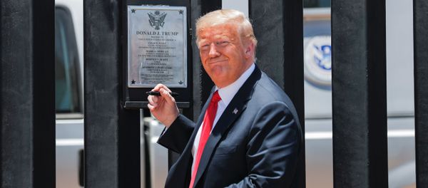 U.S. President Donald Trump smiles as he prepares to autograph a plaque commemorating the construction of the 200th mile of border wall while visiting the wall on the U.S.-Mexico border in San Luis, Arizona, U.S., June 23, 2020. U.S. President Donald Trump smiles as he prepares to autograph a plaque commemorating the construction of the 200th mile of border wall while visiting the wall on the U.S.-Mexico border in San Luis, Arizona, U.S., June 23, 2020. - Sputnik International