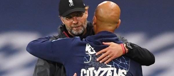 Liverpool manager Juergen Klopp with Manchester City manager Pep Guardiola after the match, as play resumes behind closed doors following the outbreak of the coronavirus disease (COVID-19). - Sputnik International