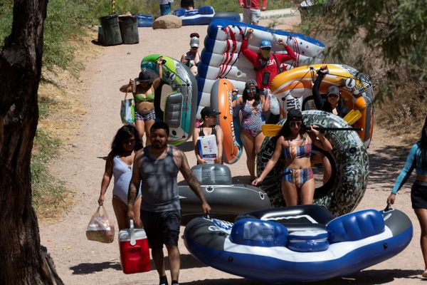 People walk to go tubing on Salt River amid the outbreak of the coronavirus disease (COVID-19) in Arizona, US, June 27, 2020 People walk to go tubing on Salt River amid the outbreak of the coronavirus disease (COVID-19) in Arizona, US, June 27, 2020 - Sputnik International