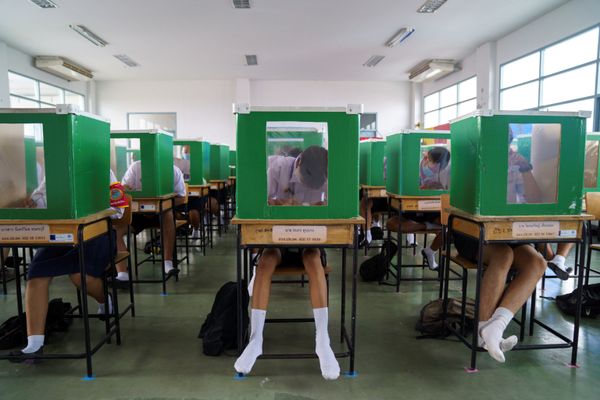 Students of Sam Khok school wearing face masks and face shields are seen inside old ballot boxes repurposed into partitions as they attend a class after the Thai government eased isolation measures and introduced social distancing to prevent the spread of the coronavirus disease (COVID-19), as schools nationwide reopen, at Pathum Thani province, Thailand, July 1, 2020 Students of Sam Khok school wearing face masks and face shields are seen inside old ballot boxes repurposed into partitions as they attend a class after the Thai government eased isolation measures and introduced social distancing to prevent the spread of the coronavirus disease (COVID-19), as schools nationwide reopen, at Pathum Thani province, Thailand, July 1, 2020 - Sputnik International