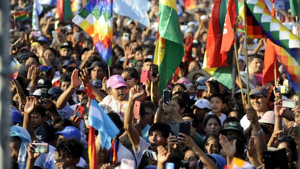 Supporters of former Bolivian President Evo Morales, exiled in Argentina, take part in a meeting organized by the Bolivianos Unidos group in Mendoza, to support the presidential candidate of the Movement to Socialism (MAS) party, Luis Arce, in Mendoza, Argentina, on March 07, 2020 - Sputnik International