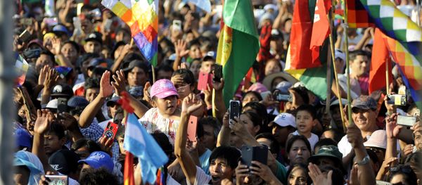 Supporters of former Bolivian President Evo Morales, who is living in exile in Argentina, take part in a meeting organised by the Bolivianos Unidos group in Mendoza, to support the presidential candidate of the Movement to Socialism (MAS) party, Luis Arce, in Mendoza, Argentina, on 7 March 2020 Supporters of former Bolivian President Evo Morales, who is living in exile in Argentina, take part in a meeting organised by the Bolivianos Unidos group in Mendoza, to support the presidential candidate of the Movement to Socialism (MAS) party, Luis Arce, in Mendoza, Argentina, on 7 March 2020 - Sputnik International