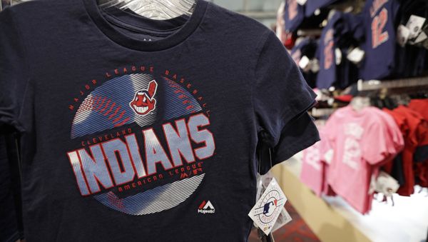 A kids shirt with the Chief Wahoo logo hangs at the Cleveland Indians team shop, Monday, Jan. 29, 2018, in Cleveland. Divisive and hotly debated, the Chief Wahoo logo is being removed from the Cleveland Indians' uniform next year.  - Sputnik International