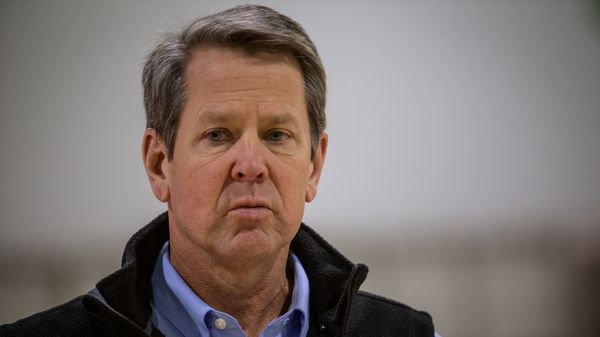 Georgia Gov. Brian Kemp listens to a question from the press during a tour of a massive temporary hospital at the Georgia World Congress Center on Thursday, April 16, 2020, in Atlanta. Kemp took part in a tour of the 200-bed facility, constructed quickly in the lower levels of the Georgia World Congress Center which normally plays host to large conventions and sporting events. Georgia Gov. Brian Kemp listens to a question from the press during a tour of a massive temporary hospital at the Georgia World Congress Center on Thursday, April 16, 2020, in Atlanta. Kemp took part in a tour of the 200-bed facility, constructed quickly in the lower levels of the Georgia World Congress Center which normally plays host to large conventions and sporting events. - Sputnik International