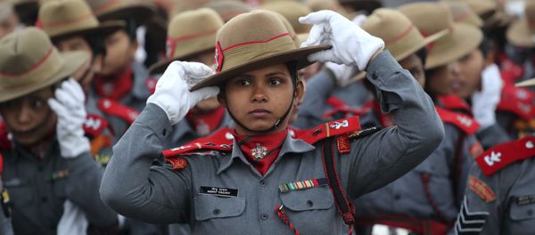 Indian Para-military women soldiers of Assam Rifles adjust their hats during the rehearsals for the upcoming Republic Day parade on Rajpath, the ceremonial boulevard, in New Delhi, India, Monday, Jan. 14, 2019 - Sputnik International