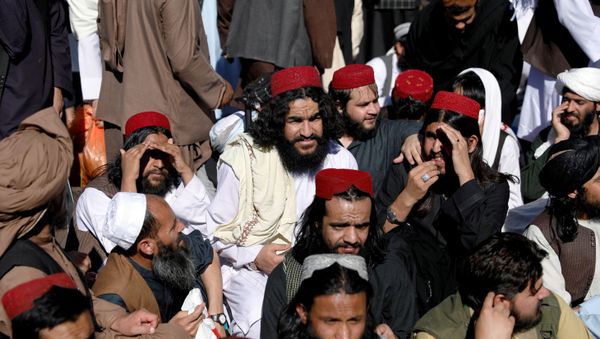 Newly freed Taliban prisoners sit at Pul-i-Charkhi prison, in Kabul - Sputnik International