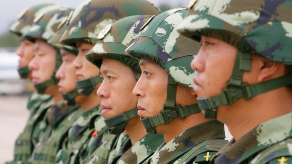 Special troops of the Beijing division of the People's Armed Police of China arrive in Russia - Sputnik International