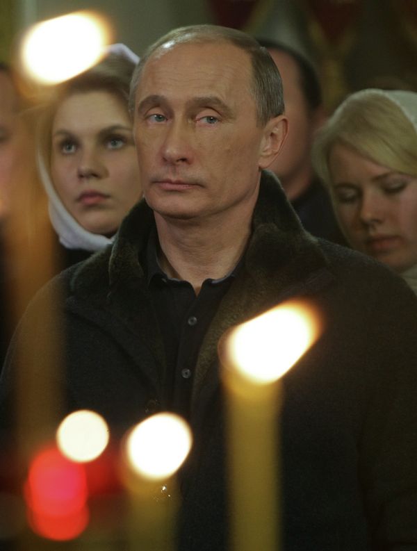 Prime Minister Vladimir Putin attended a Christmas service at the Church of the Holy Martyrs Alexander and Antonina Rimsky in the Kostroma Region village of Selishche. - Sputnik International